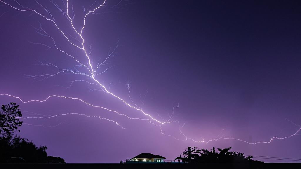 Lightning near a rural building. Wikipedia Commons License. Photo by Brezhnev30.
