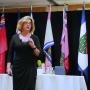 Clara Capano speaking on mental wellbeing for first responders at Fire-Rescue Canada 2026. 